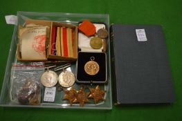 Five WW2 medals, unnamed together with sporting medals and other items to include a book 'They Die