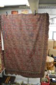 A good Persian rug, rust ground with allover Boteh design, 290cm x 170cm.