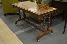 A good parquetry inlaid Victorian walnut stretcher table.