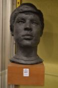 Sally Hersh, head study of a young man, resin, on a wooden base.