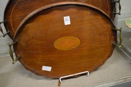 An Edwardian inlaid mahogany twin handled tray.