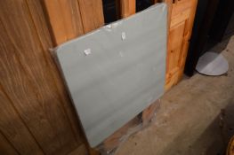 A metal folding garden table.