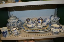 A quantity of blue and white china.