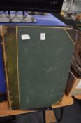 A large scrap album containing engravings.