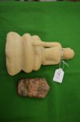 Carved soap stone Buddha together with another early carving.