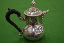 A good small silver lidded jug.