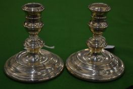 A pair silver candlesticks.