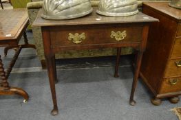 An oak single drawer side table.