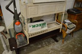 A painted wooden two-tier jardiniere stand/planter together with a pine table.