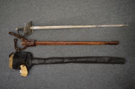 A George V dress sword with leather scabbard and outer cover.