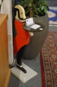 A novelty painted wooden waiter/stand.
