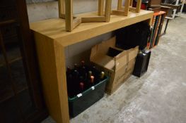 A Heals oak console table.