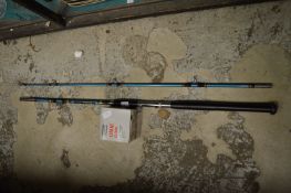 A fishing rod and a boxed reel.