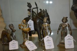 Bronze figure on horseback, possibly Benin together with a similar model of a cow and calf and three