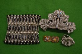 Decorative bracelet, hair clip and a ring.