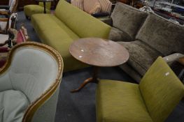 A large green upholstered bench style settee with pair of matching chairs.