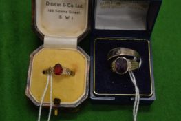 A gold dress ring together with two silver and Blue John rings.