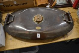 A large twin handled copper bed warming pan.