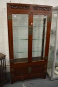 A Chinese hardwood standing display cabinet.