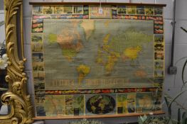 An educational map of the world with hanging rail.