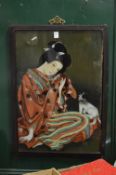 A Chinese reverse painting on glass depicting a seated woman and cat.