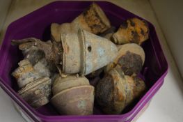 A quantity of excavated military shell heads.