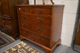 A reproduction Georgian style mahogany chest of drawers.
