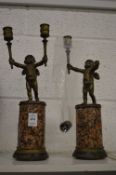 A pair of marble and bronze cherub candelbra (faults).