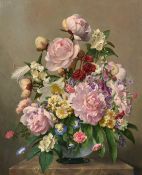 John E. Nicholls (1885-1955), a still life of mixed flowers in bloom in a glass vase, oil on canvas,