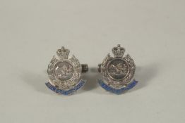 A PAIR OF ROYAL HONG KONG SILVER AND ENAMEL CUFF LINKS.