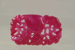 A CHINESE CARVED PINK TOURMALINE PENDANT. 7cms x 4.5cms.