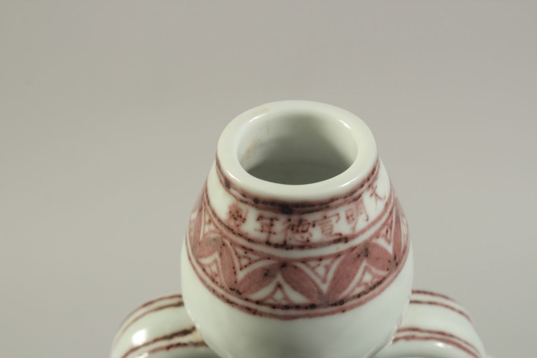 A CHINESE UNDERGLAZE RED PORCELAIN MOONFLASK. 31cms high. - Image 6 of 7
