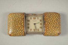 A MOVADO CHRONOMETRE STERLING SILVER TRAVELLING WATCH with pull apart shagreen case.