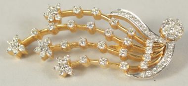 AN 18CT GOLD DIAMOND COMET PENDANT