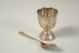 A CHRISTENING EGG CUP AND SPOON in a case. Birmingham 1963.