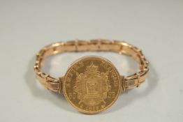 A FRENCH 50 FRANC GOLD COIN BRACELET, dated 1859. Weight: 30gms.