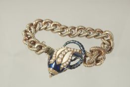 A SILVER GILT .925, ENAMEL AND PEARL SNAKE BRACELET. 53gms.