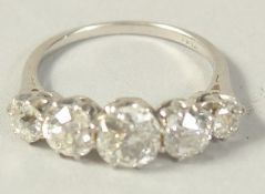 A VERY GOOD PLATINUM FIVE STONE DIAMOND RING. Approx. 2 carats.