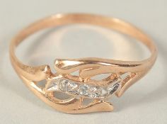A 14CT ROSE GOLD DIAMOND RING