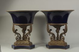 A GOOD PAIR OF LARGE SEVRES DESIGN BLUE PORCELAIN AND ORMOLU URNS, with pineapple and scrolling