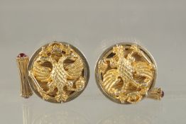 A PAIR OF RUSSIAN SILVER GILT EAGLE CUFFLINKS. Mark Head 84. 66gms.