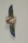 A SILVER AND ENAMEL PHARAOH BROOCH.