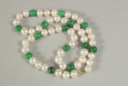 A STRING OF JADE AND PEARLS.