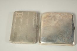 A PLAIN CURVING SILVER CIGARETTE CASE, London, 1906 and an engraved turned silver cigarette case,