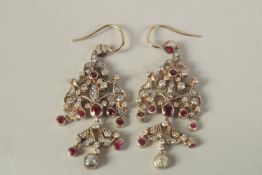 A PAIR OF RUBY AND DIAMOND DROP EARRINGS with 4ct diamonds and natural rubies.