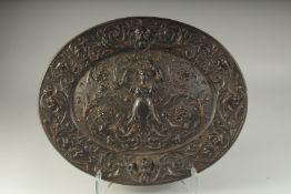 A GOOD EARLY CAST IRON BRONZED CIRCULAR CLASSICAL CHARGER. 18.5ins diameter.