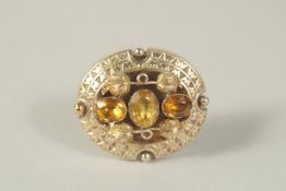 A 9CT GOLD VICTORIAN CITRINE BROOCH with locket back