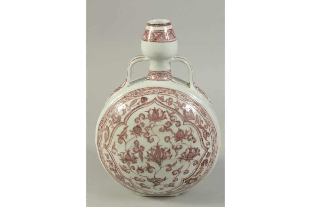 A CHINESE UNDERGLAZE RED PORCELAIN MOONFLASK. 31cms high. - Image 1 of 7