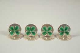 A SET OF FOUR S. MORDAN & Co. SILVER AND GREEN ENAMEL IRISH MENU HOLDERS, decorated with enamel
