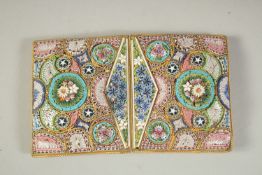 A MOSAIC BELT BUCKLE.